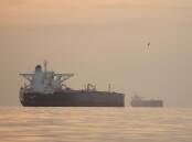 Iran's hold on the Strait of Hormuz has seen fuel prices rise and left ships stranded. Photo: AP PHOTO