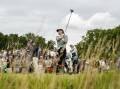 Joaquín Niemann hits his shot from the second tee during the final round of the LIV Golf UK event. Photo: AP PHOTO
