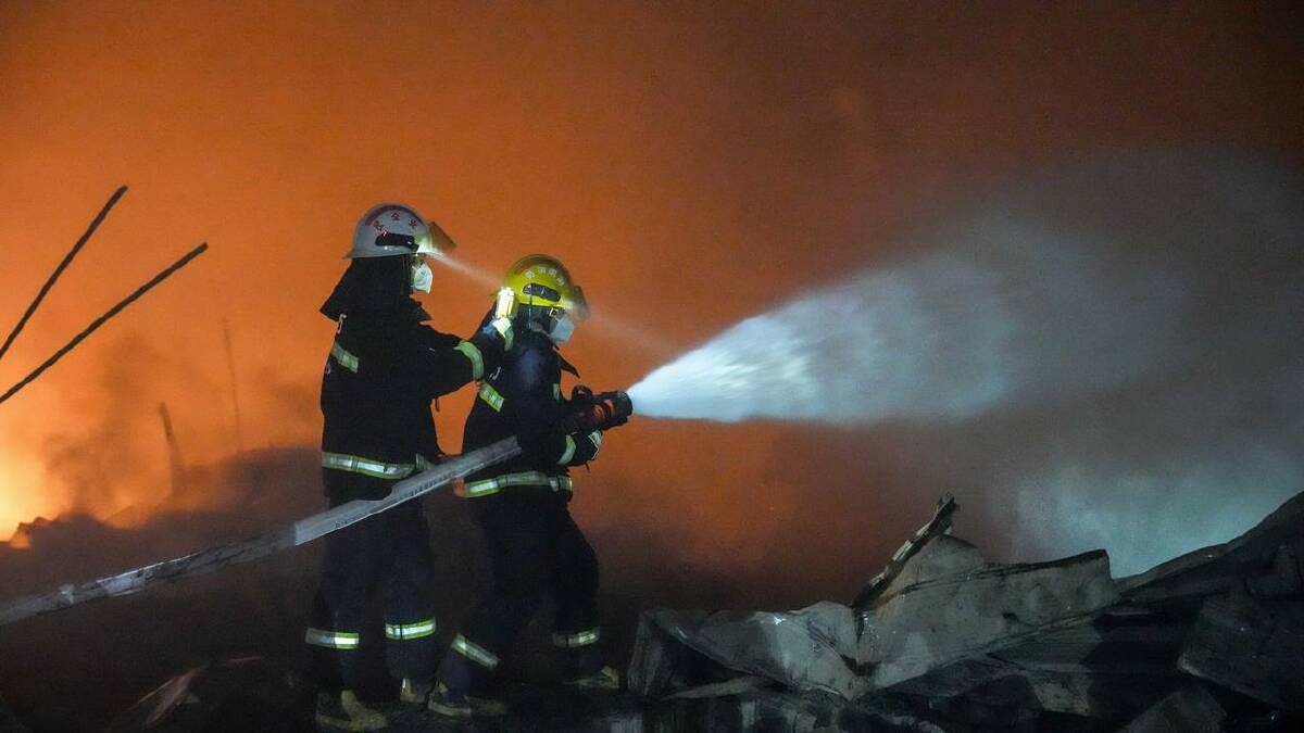 Hundreds of emergency workers were sent to the Huasheng Fireworks Manufacturing and Display Company. (AP PHOTO)