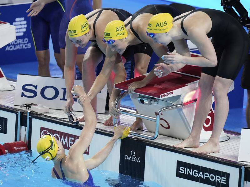Australia won gold in the women's 4x100m relay freestyle at the world championships in Singapore. Photo: AP PHOTO Australia won gold in the women's 4x100m relay freestyle at the world championships in Singapore. Photo: AP PHOTO