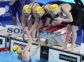 Australia won gold in the women's 4x100m relay freestyle at the world championships in Singapore. Photo: AP PHOTO