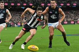 It could be the Jack of all trades if Silvagni (right) joins Crisp at Collingwood. Photo: James Ross/AAP PHOTOS