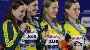 Mollie O'Callaghan, Meg Harris, Milla Jansen and Olivia Wunsch won the 4x100m freestyle relay final. Photo: EPA PHOTO