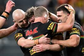 The Panthers have kept their NRL top four hopes alive with a dominant win over Wests Tigers. Photo: Steven Markham/AAP PHOTOS