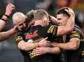 The Panthers have kept their NRL top four hopes alive with a dominant win over Wests Tigers. Photo: Steven Markham/AAP PHOTOS