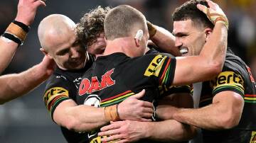 The Panthers have kept their NRL top four hopes alive with a dominant win over Wests Tigers. Photo: Steven Markham/AAP PHOTOS