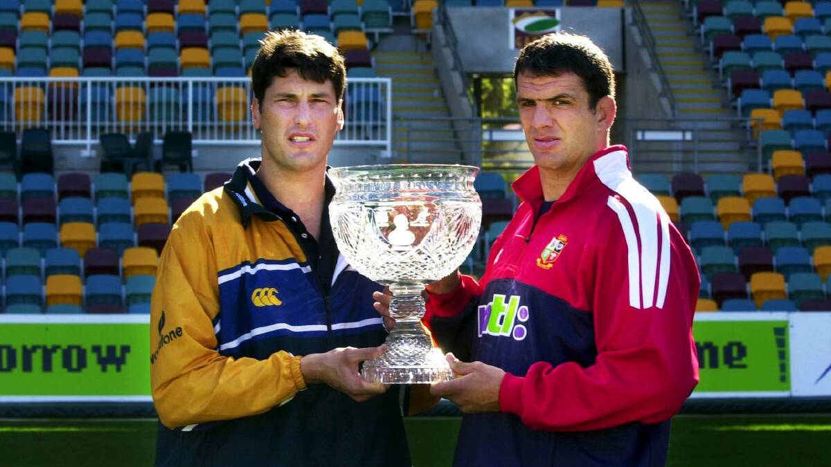 Wallabies captain John Eales and Lions skipper Martin Johnson with the Tom Richards Cup in 2001. (Dave Hunt/AAP PHOTOS) Wallabies captain John Eales and Lions skipper Martin Johnson with the Tom Richards Cup in 2001. (Dave Hunt/AAP PHOTOS)
