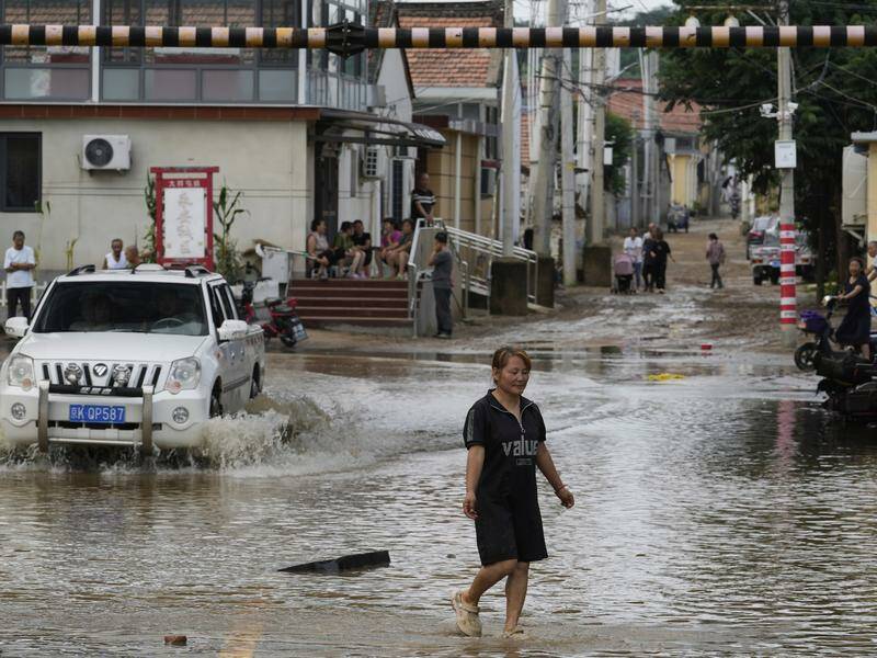 The latest monsoon in China has caused weeks of atmospheric chaos since early July. Photo: AP PHOTO The latest monsoon in China has caused weeks of atmospheric chaos since early July. Photo: AP PHOTO