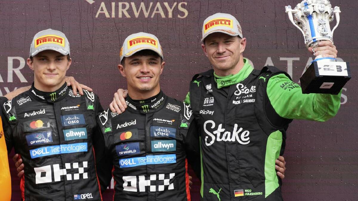 Oscar Piastri, Lando Norris and Nico Hulkenberg on the podium after the British Grand Prix. (AP PHOTO)
