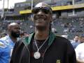 Football fan Snoop Dogg is "proud to be part of Swansea City". Photo: AP PHOTO