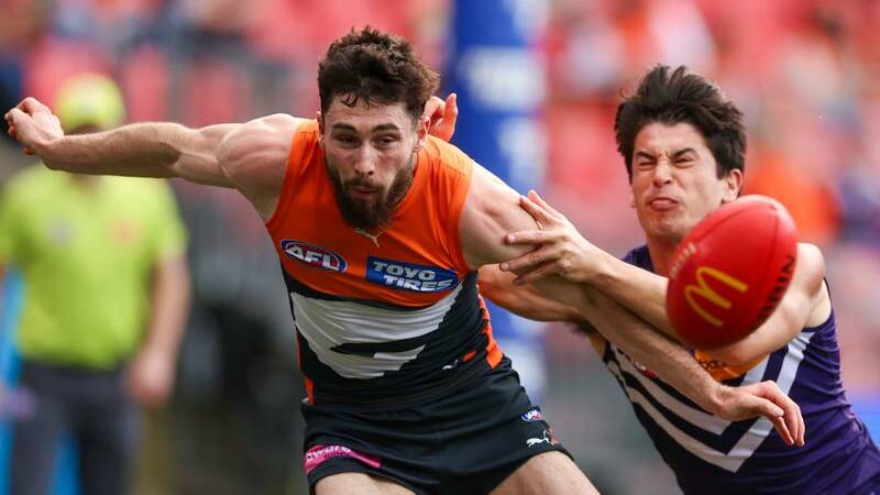 Lachie Ash says emotions are running high both for the Giants and Port when they meet on Saturday.