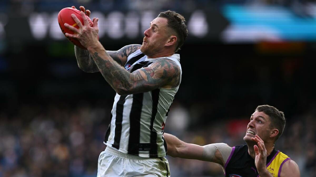 Tim Membrey showed strong hands on his way to kicking two goals against Richmond. (James Ross/AAP PHOTOS) Tim Membrey showed strong hands on his way to kicking two goals against Richmond. (James Ross/AAP PHOTOS)