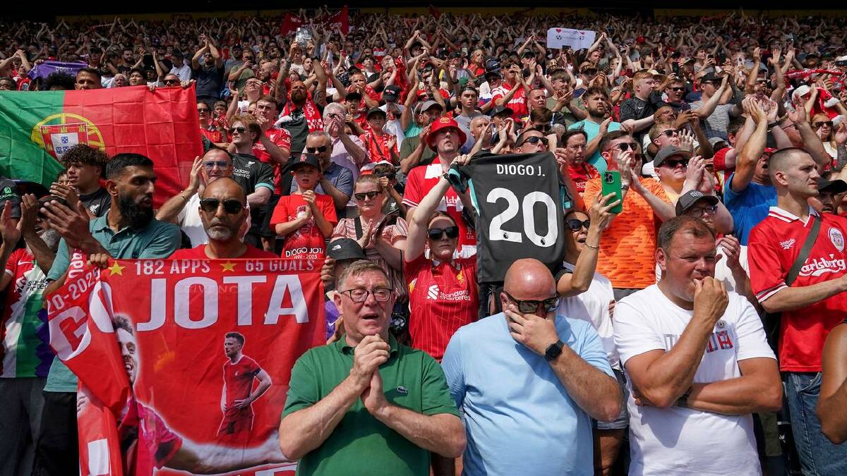 Liverpool fans paid tribute to Diogo Jota at a pre-season friendly against Preston. (AP PHOTO)