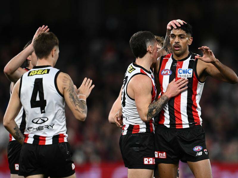 St Kilda teammates congratulate Nasiah Wanganeen-Milera (right) for scoring against the Demons. Photo: Joel Carrett/AAP PHOTOS St Kilda teammates congratulate Nasiah Wanganeen-Milera (right) for scoring against the Demons. Photo: Joel Carrett/AAP PHOTOS