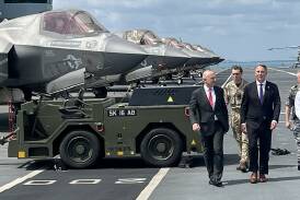 Australia and the UK have signed a 50-year pact, as the AUKUS agreement is under review in the US. Photo: Lloyd Jones/AAP PHOTOS