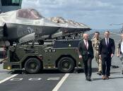Australia and the UK have signed a 50-year pact, as the AUKUS agreement is under review in the US. Photo: Lloyd Jones/AAP PHOTOS