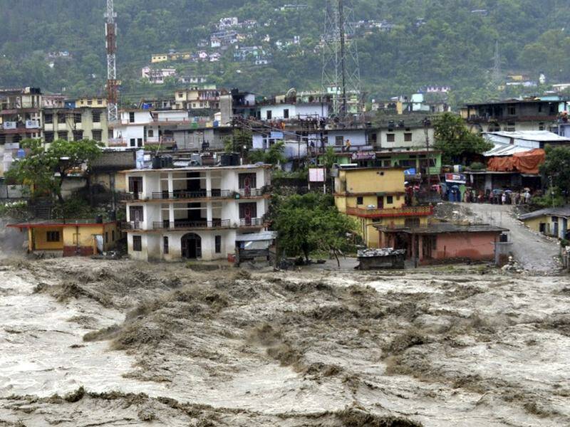 Flash flooding and mudslides cleaved through a village in the northern Indian state of Uttarakhand. Photo: AP PHOTO