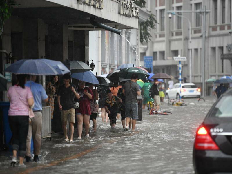 A city in northern China has recorded 447.4mm of rain during 24 hours. Photo: AP PHOTO A city in northern China has recorded 447.4mm of rain during 24 hours. Photo: AP PHOTO