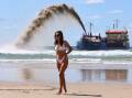 Hope of restoring the Gold Coast's iconic beaches within three years defies logic, experts say. Photo: Jason O'BRIEN/AAP PHOTOS
