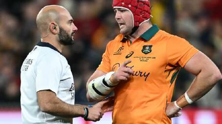 Referee Andrea Piardi reviewed the controversial clean-out but let the Test-winning try stand. Photo: Joel Carrett/AAP PHOTOS