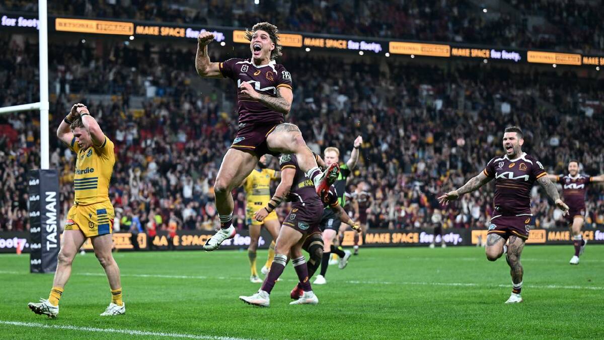 Reece Walsh celebrates after scoring what he thought was a match-winning try. (Dave Hunt/AAP PHOTOS)