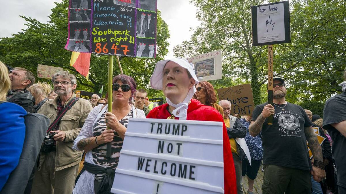 Hundreds of protesters took to the streets of Edinburgh to voice their opposition to Trump. (AP PHOTO) Hundreds of protesters took to the streets of Edinburgh to voice their opposition to Trump. (AP PHOTO)
