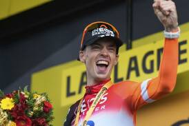 Dutchman Thymen Arensman celebrates after his win on the brutal 19th stage of the Tour de France. Photo: AP PHOTO