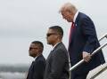 US President Donald Trump was met by authorities as he touched down in Scotland. Photo: AP PHOTO