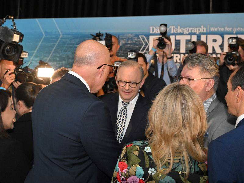 Anthony Albanese and Peter Dutton exchanged pleasantries on the campaign trail. Photo: Mick Tsikas/AAP PHOTOS Anthony Albanese and Peter Dutton exchanged pleasantries on the campaign trail. Photo: Mick Tsikas/AAP PHOTOS