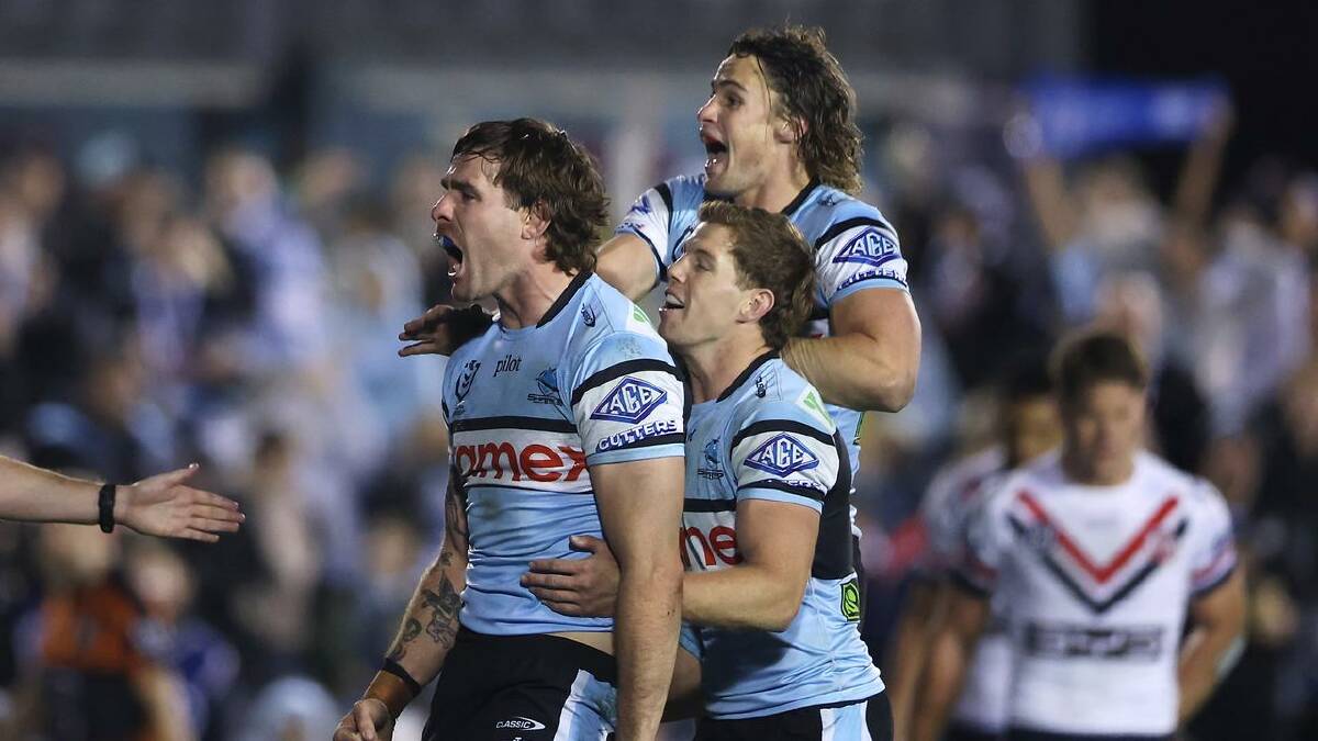 Nicho Hynes (r) celebrates with teammates after a try in Cronulla's recent win over the Roosters. (Mark Kolbe/AAP PHOTOS) Nicho Hynes (r) celebrates with teammates after a try in Cronulla's recent win over the Roosters. (Mark Kolbe/AAP PHOTOS)