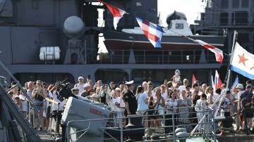 People gather as Russian President Vladimir Putin visits the frigate "Admiral Grigorovich" . Photo: AP PHOTO