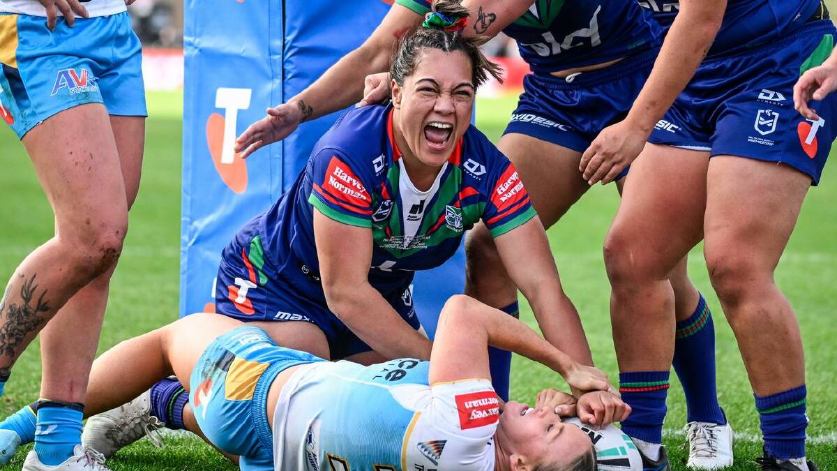 The Warriors' Metanoia Fotu-Moala roared with delight after scoring a try against the Titans.  (Andrew Cornaga/AAP PHOTOS)