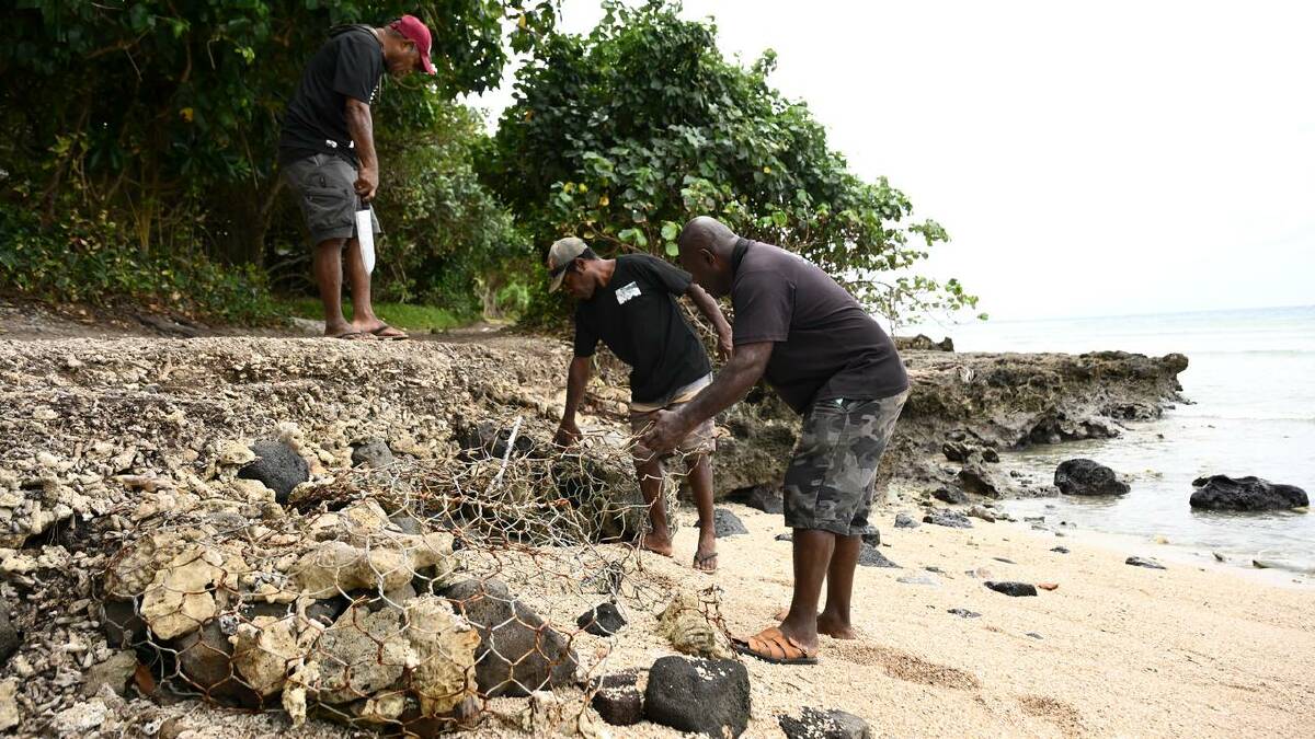 Work to prevent beach erosion falls under the Vanuatu Community-based Climate Resilience Project. (Joel Carrett/AAP PHOTOS)