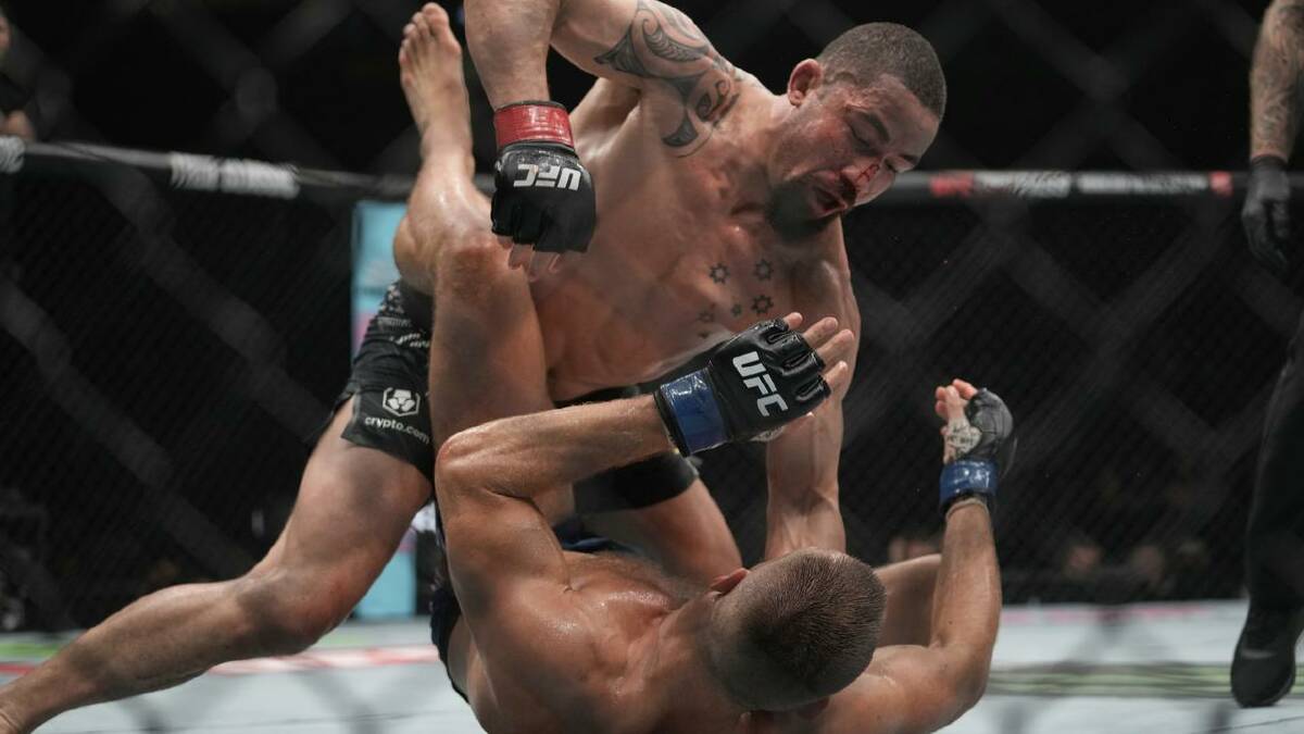 Robert Whittaker goes on the attack against Reinier de Ridder in the UAE. (AP PHOTO) Robert Whittaker goes on the attack against Reinier de Ridder in the UAE. (AP PHOTO)