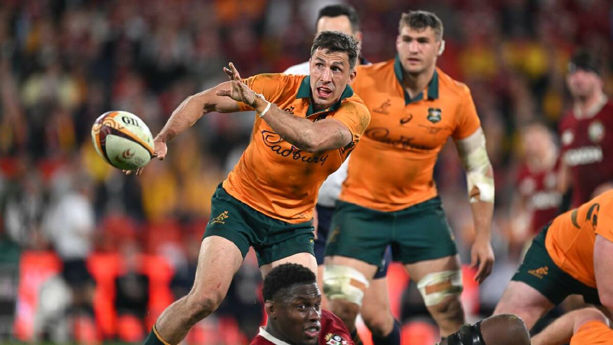 Jake Gordon, spinning a pass wide in Brisbane, retains his No.9 jersey for the second Test. (Dave Hunt/AAP PHOTOS)