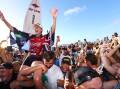 Comeback star Stephanie Gilmore celebrates her seventh Gold Coast Pro title. Photo: Jason O'BRIEN/AAP PHOTOS