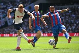 Dejan Kulusevski (l) shoots but hurts himself in Tottenham's 2-0 loss to Crystal Palace. Photo: EPA PHOTO
