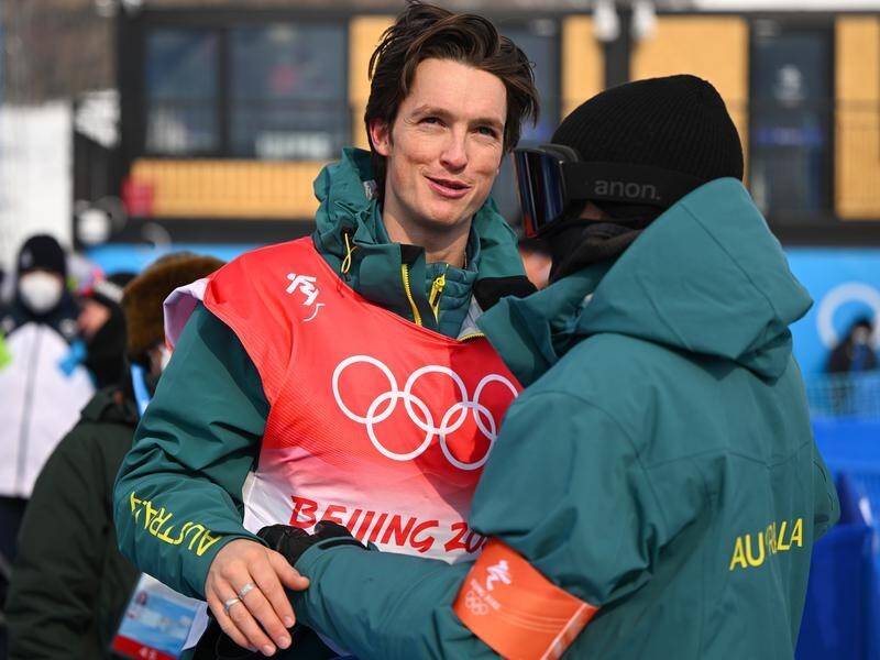 Scotty James of Australia is all smiles with his brother Sean after Olympic halfpipe qualifiying. Scotty James of Australia is all smiles with his brother Sean after Olympic halfpipe qualifiying.