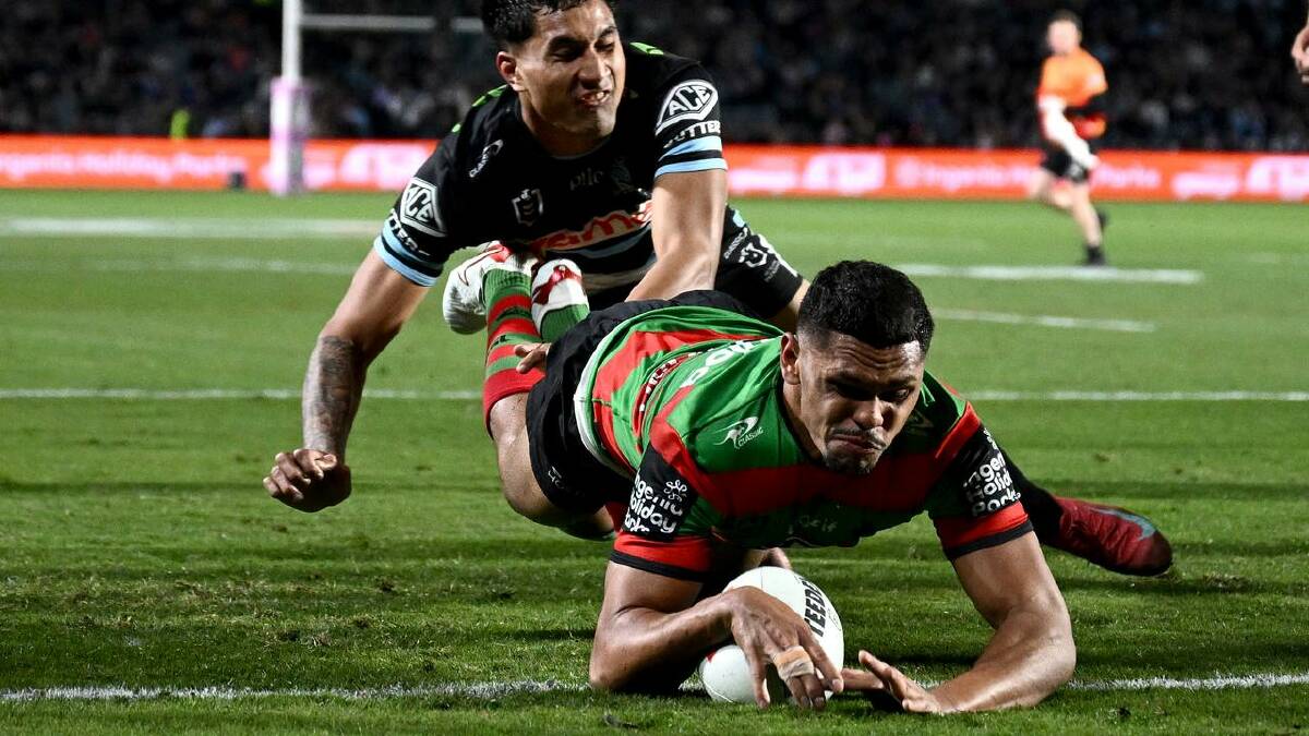 Tyrone Munro finished the first half in style, scoring a try for the Rabbitohs. (Dan Himbrechts/AAP PHOTOS)