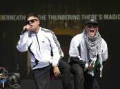 Kneecap's Naoise O Caireallain and Liam Og O hAnnaidh perform at the Glastonbury Festival. Photo: AP PHOTO