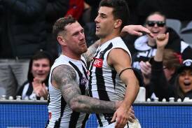 Tim Membrey and Nick Daicos applied plenty of scoreboard pressure against the Tigers. Photo: James Ross/AAP PHOTOS
