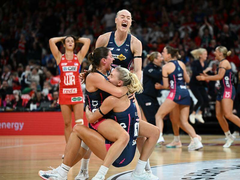 Vixens players were elated after their nail-biting one-goal preliminary final win over the Swifts.  Photo: Bianca De Marchi/AAP PHOTOS
