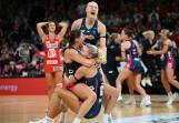 Vixens players were elated after their nail-biting one-goal preliminary final win over the Swifts.  Photo: Bianca De Marchi/AAP PHOTOS