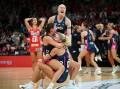 Vixens players were elated after their nail-biting one-goal preliminary final win over the Swifts.  Photo: Bianca De Marchi/AAP PHOTOS