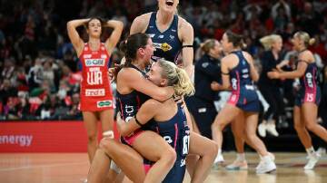 Vixens players were elated after their nail-biting one-goal preliminary final win over the Swifts.  Photo: Bianca De Marchi/AAP PHOTOS