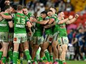 Raiders players celebrate Jamal Fogarty's winning penalty goal against the Melbourne Storm. (HANDOUT/NRL PHOTOS)