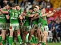 Raiders players celebrate Jamal Fogarty's winning penalty goal against the Melbourne Storm. (HANDOUT/NRL PHOTOS)