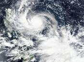 NASA satellite images show Super Typhoon Noru approaching the Philippines. (AP PHOTO)