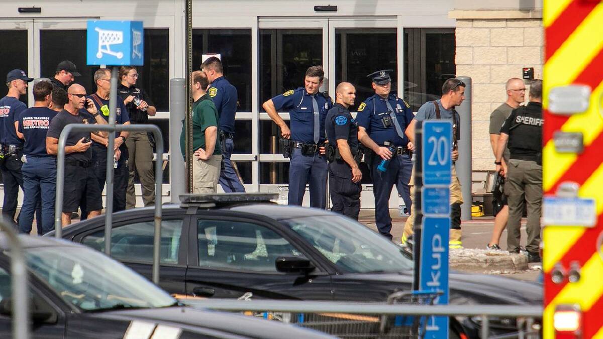 Eleven people were taken to hospital after the attack in Traverse City, a popular holiday spot. (AP PHOTO)