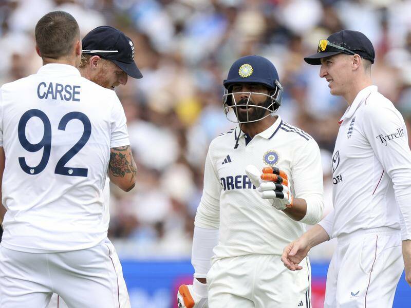 Harry Brook watches as Ravindra Jadeja confronts Brydon Carse after a collision at Lord's. Photo: AP PHOTO Harry Brook watches as Ravindra Jadeja confronts Brydon Carse after a collision at Lord's. Photo: AP PHOTO